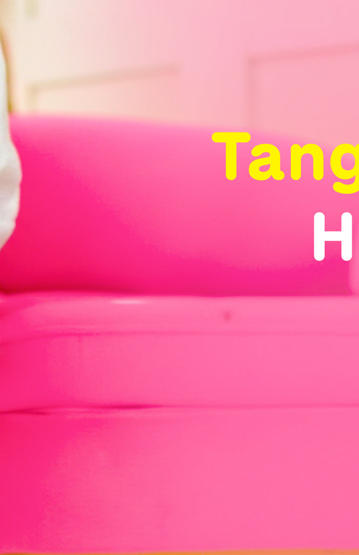 Home banner of kid holding the bottle -Tangle -free hair happy smiles