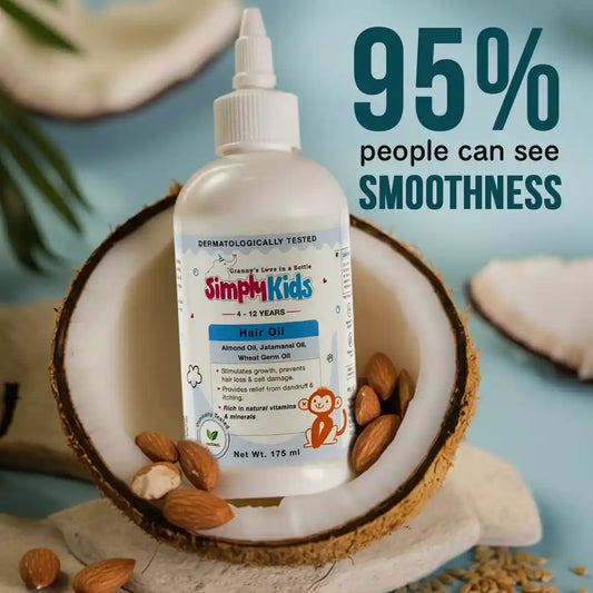 Bottle of Simply Kids Hair Oil for children aged 4–12 placed inside a fresh coconut shell with almonds around it, highlighting almond, jatamansi, and wheat germ oils; label shows “95% people can see smoothness,” promoting a gentle, dermatologically tested kids hair care product for smoother, healthier hair