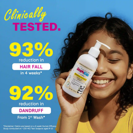 Smiling young girl holding a kids anti-dandruff shampoo bottle, highlighting clinically tested results with 93% reduction in hair fall and 92% reduction in dandruff in 4 weeks